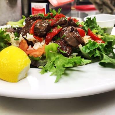 Build Your Own Salad with Bourbon Brown Sugar Hanger Steak on a bed of local Arcadian Farms greens.
