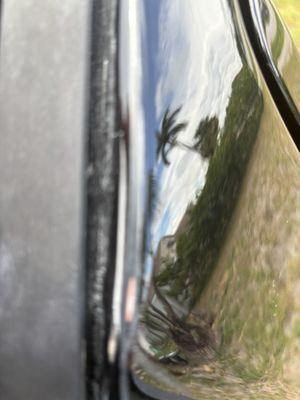 Burnt paint from buffing passenger side above door