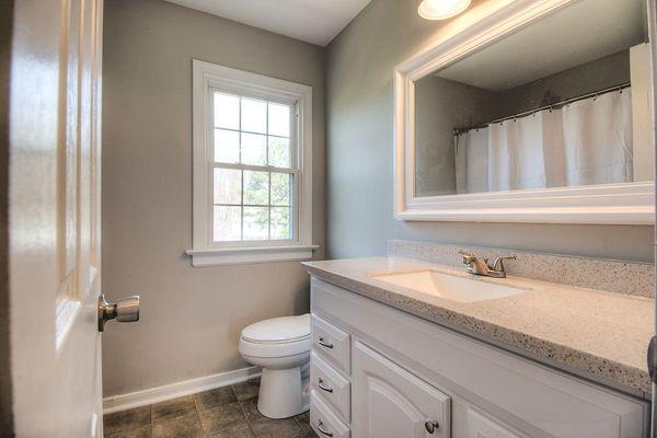 Bathroom remodel, replaced tub, repaired wood rot on floor, replaced toilet, vanity, mirror and lighting - Spring 2016