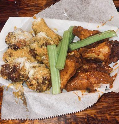 Left: hot garlic parm wings. Right: wet Cajun wings