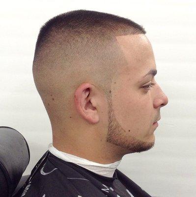 High skin fade with beard.