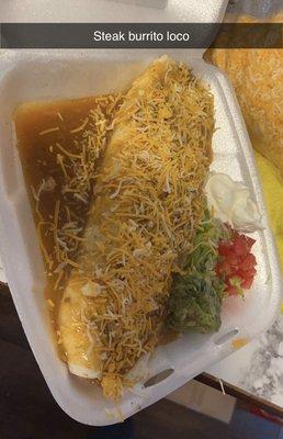 Came and tried are delicious famous burrito loco with your choice of meat steak Adovada carnitas