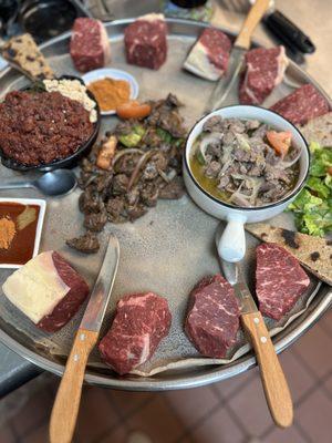 Kurt,freshly cut lamb tibs, tender beef tibs, and Nazret Kitfo special.