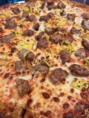 Sausage and banana pepper pizza light sauce light cheese and well done, excellent!