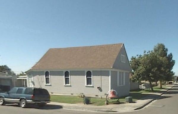 A view from the intersection of 9th Street & H Street. The church stands out due to the big red bell mounted at the corner.