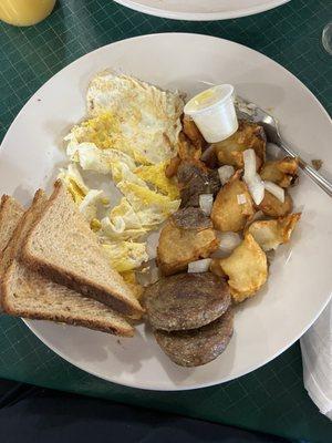 Eggs,sausage, toast, and home fries.