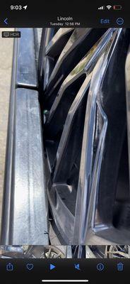 Rim against rail on tow truck damaging it