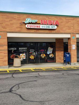 Front of restaurant. Located in a strip mall.