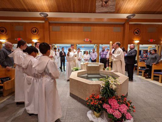 RCIA Class of 2022 being baptized