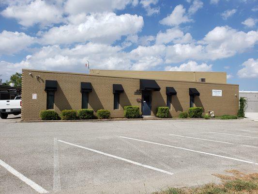 Brakes and More is located on the left side of this building.