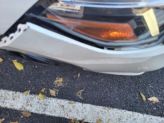 Front right bumper needs.to be pushed back in, or be repaired. Not replaced.