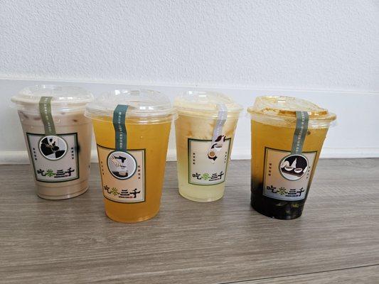 Left to right: Cassia with cream with grass jelly, green tea mango, lemon condensed milk with mango, high mountain pouchong tea with boba