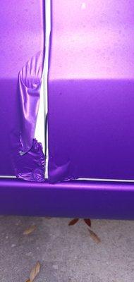 Day 2 Wasn't real pleasant driving down the road having the vehicle wrap falling off my car in the wind