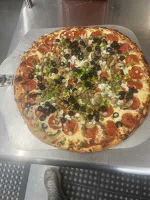 Tommy tomatoes masterpiece pizza