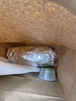 Breakfast burrito; bacon (extra crispy) added sausage, and green salsa