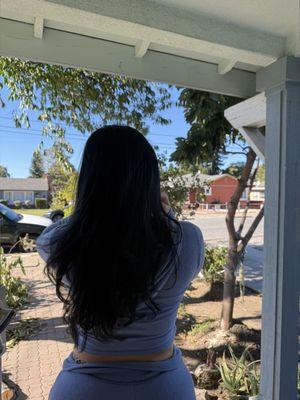 Fresh black dye and haircut with long layers