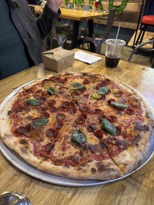 Pepperoni with hot peppers on half