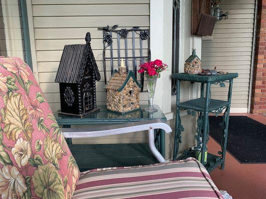 Front Porch Bird houses and a gliding couch like I had when I was growing up