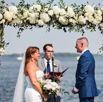 Stunning floral arch for a wedding at The Inn at Perry Cabin in St. Michael's