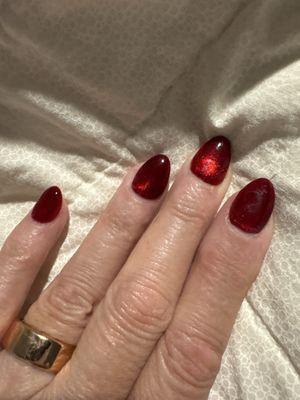 My cat eye nails. The photo does not do it justice. It's gorgeous