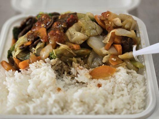 Beef and broccoli, a bite taken out