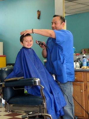 DJ loves getting his hair cut! Pablo is awesome.