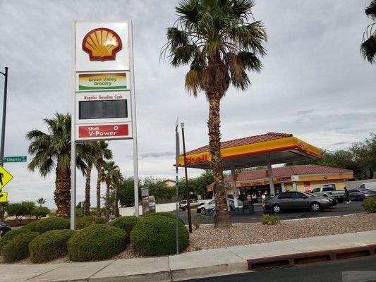 Corner store with Shell gas.