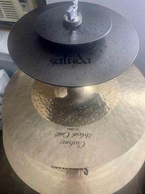 2 repaired K Zildjian cymbals and 9" & 5" Saluda bell cymbals on 1 stack