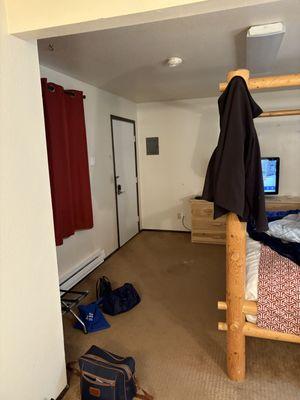 View from near bathroom towards the room door.