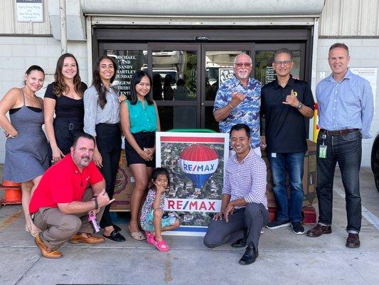 Donation day! We donated 71 frozen turkeys and a mound of can goods to the Hawaii Food Bank to feed the needy during Thanksgiving.