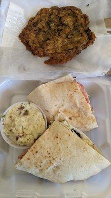 Sandwich with potato salad side and free cookie for first time visit.