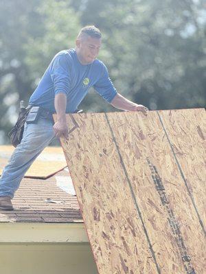 Hard at work in Pearl, Mississippi re-decking a old home