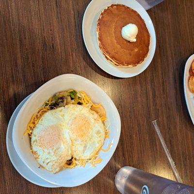 Skillet (eggs, mushrooms, cheese, onions, potato chips, etc) with side of 2 pancakes
