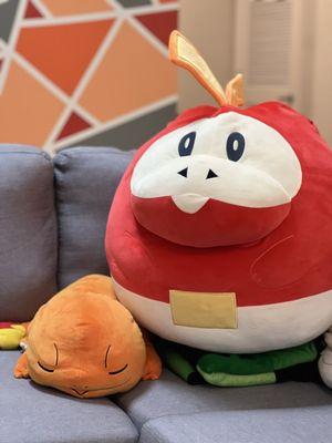 Pokemon plushies in our lounge area.