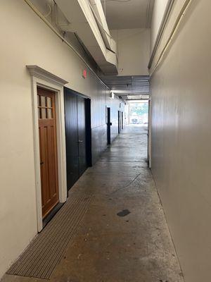 Hallway past dance studio to the entrance of shop