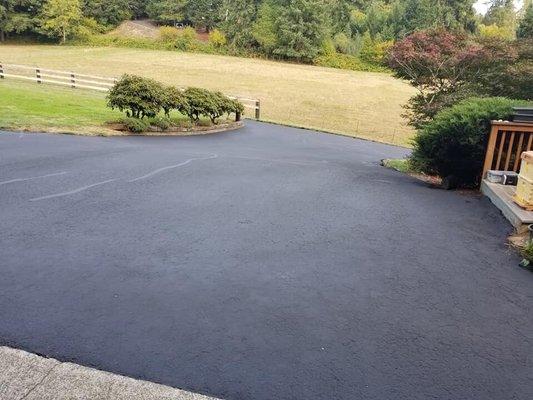 Impressed with the job they did on my driveway today! Sealed up all the cracks!