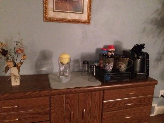 Beverage area water coffee, and tea while you wait.