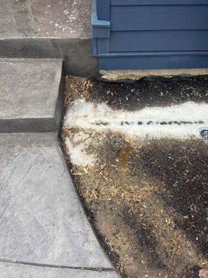 Bleached mulch. No attempt was made to protect plants or landscaping