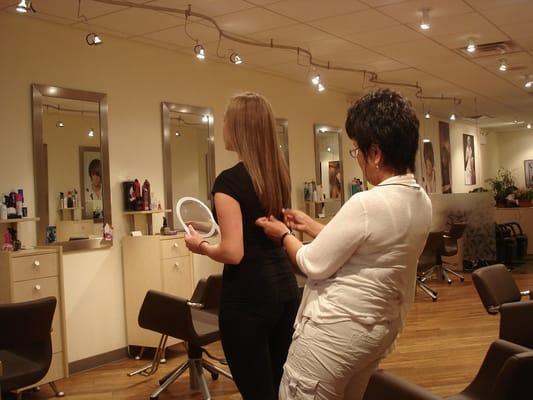 Lee finishing a beautiful haircut for a beautiful client.
