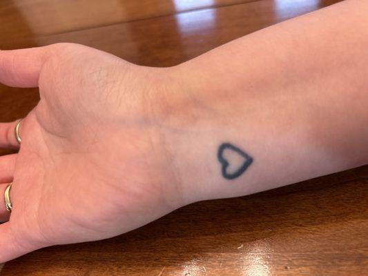 The stencil was a thin heart and I walked out with a thick ass uneven heart for $80