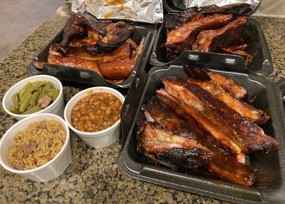 A rack of ribs, and the B.D.A with brisket, ribs, chicken, and sausage. Also my green beans, baked beans, and dirty rice.