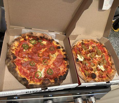 Spicy pizza and meat lovers both personal size