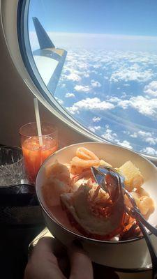 Lobster and scallops appetizer with a Bloody Mary.