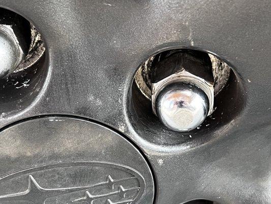 Lug nut complete pushed away from stud