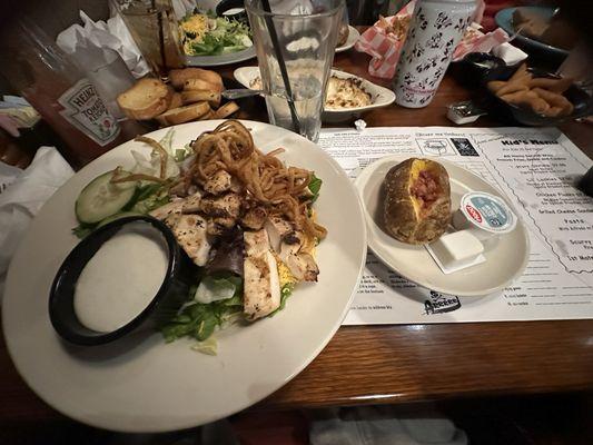 Grilled chicken salad Loaded baked potato Crab dip