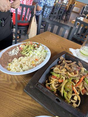 Steak fajitas w/ rice, beans & salad.
