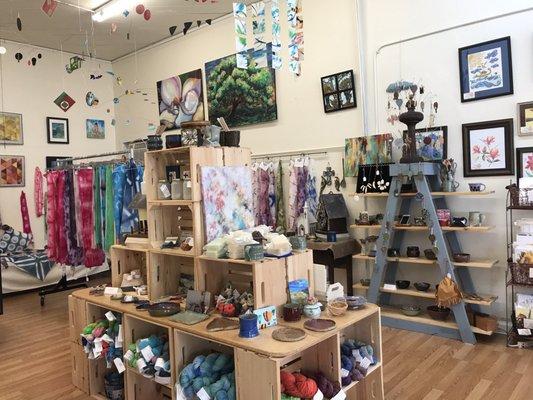 Unique reasonable priced handmade pottery, paintings, hand dyed yarn and fabrics, as well as jewelry and wood crafts. Locally made.