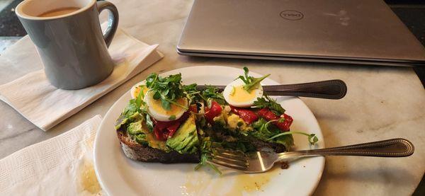Avocado Toast with Mama's Lil Peppers, Micro Greens and Hard Boiled Egg.