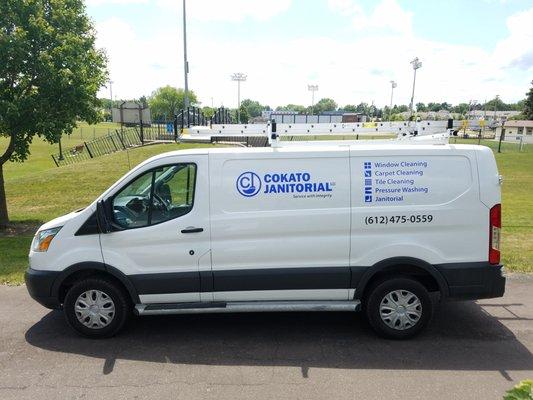Cokato Janitorial work vans.