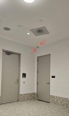 Cameras pointing to Lockers in family changing area.